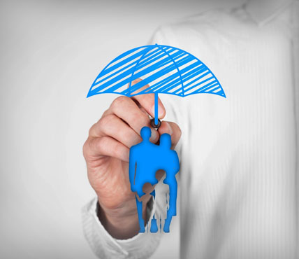 A person holding an umbrella over their head