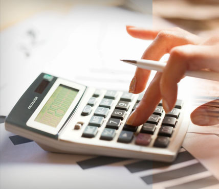 A person using a calculator to calculate their expenses.